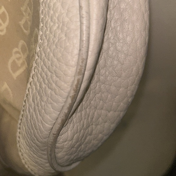 Dooney and Bourke vintage hobo purse in the color cream. - Picture 13 of 14